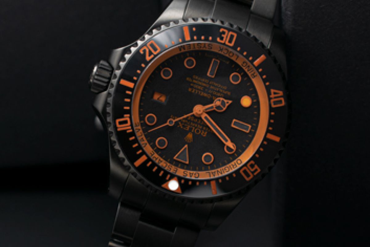 black and orange rolex