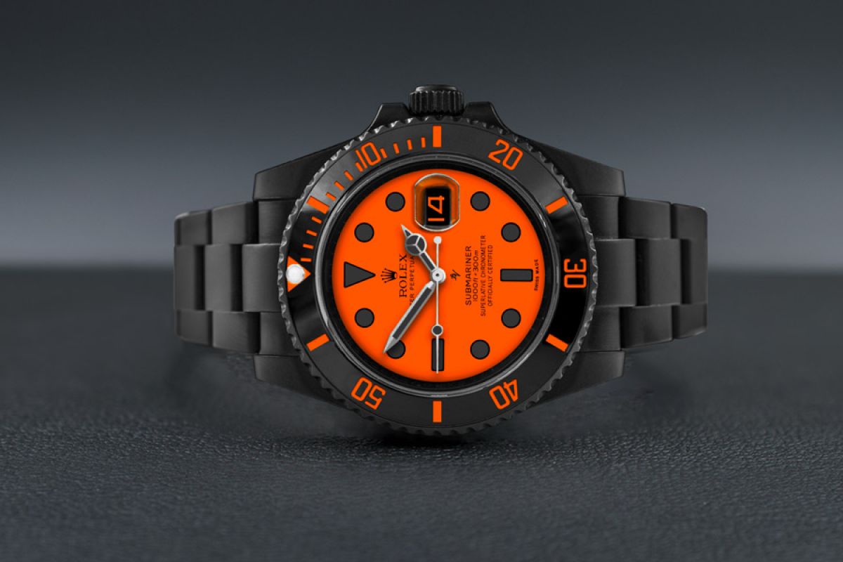 black and orange rolex with A Reserve 